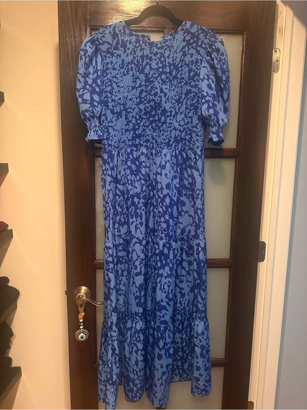 Blue Floral maxi dress with semi-fitted bodice.